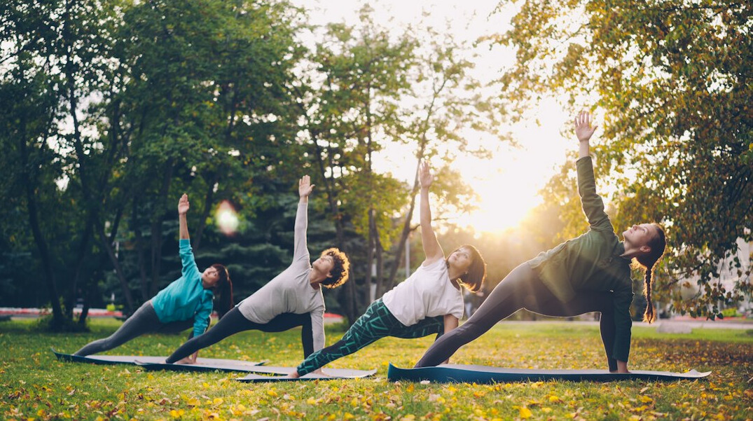 woman stretching in park